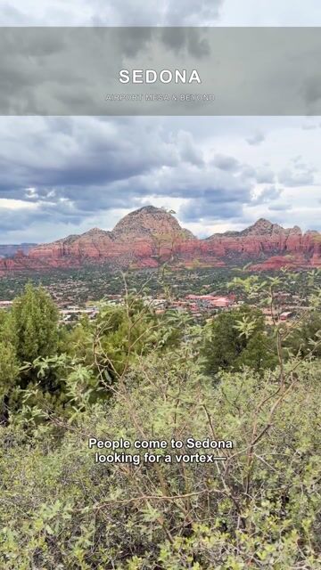 Hiking trail through red rock formations in Sedona, Arizona, with distant mountain views and desert vegetation.